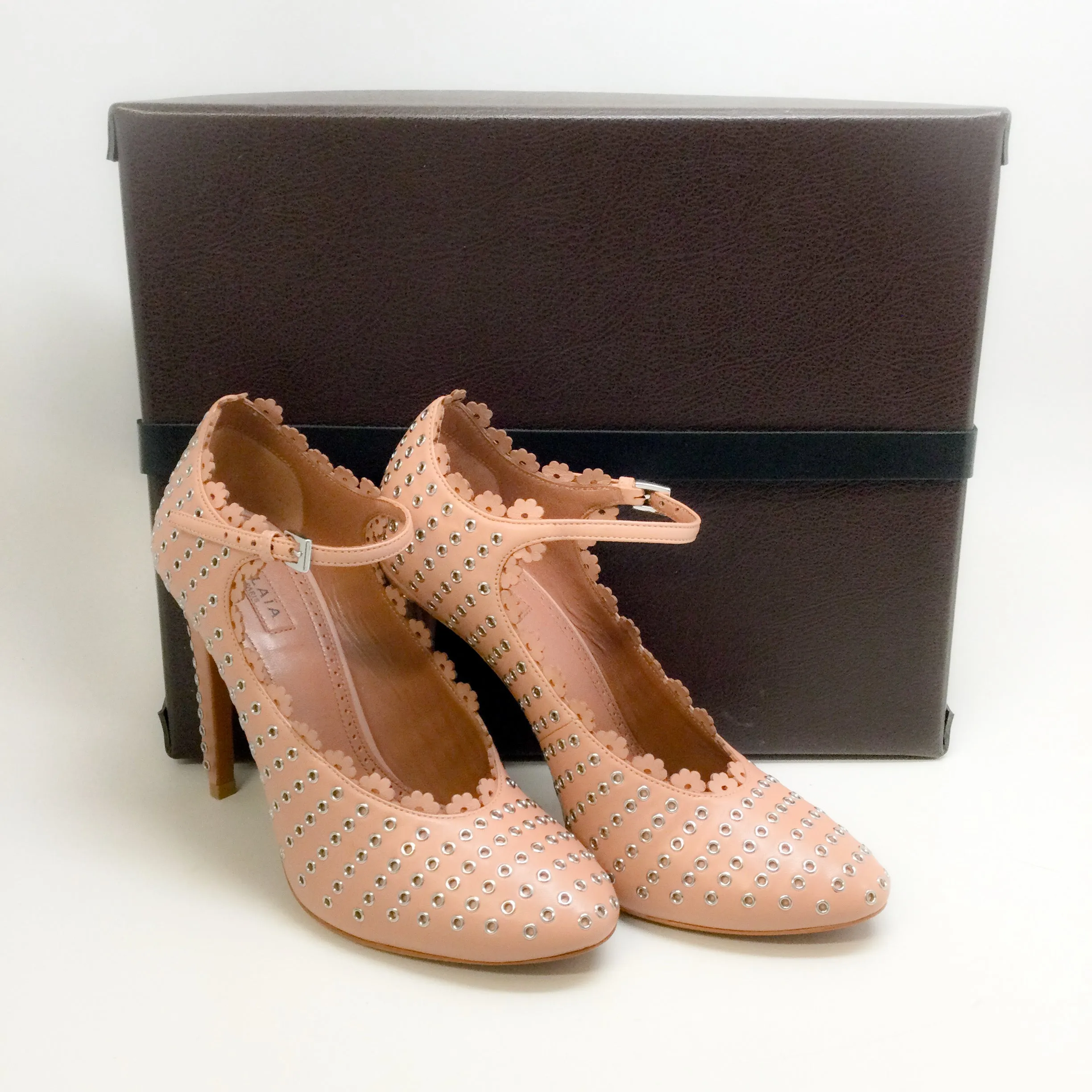 ALAÏA Nude Grommet Mary Jane Pumps